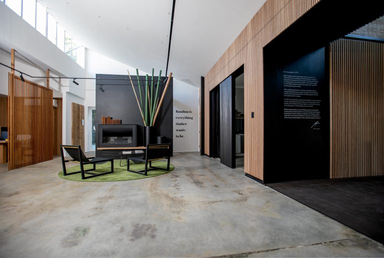 Modern Showroom - Laminated Bamboo Walls and Concrete Floors